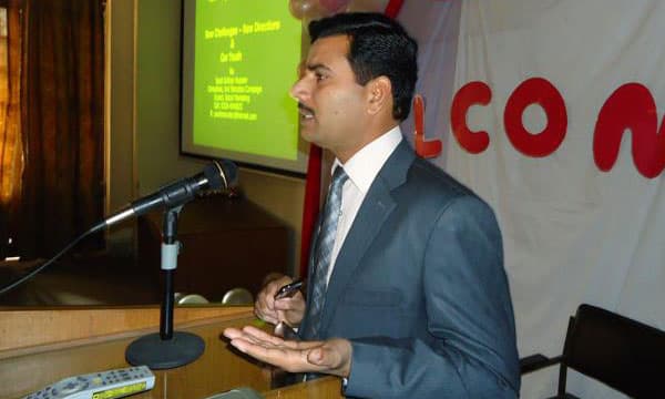 President of Silver Lining Welfare Organization speaking at an event