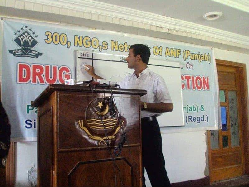 Speaker presenting at a drug-addiction awareness seminar